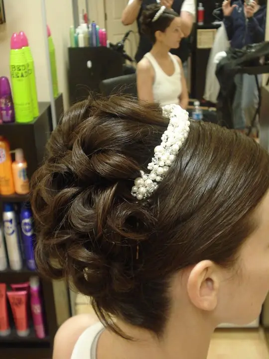 Curled updo with a pearl headband